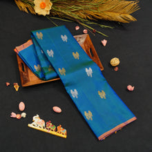 Load image into Gallery viewer,
Peacock Blue Borderless Silk Saree with Twin Parrot Butta in Gold and Silver Zari