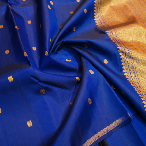 MS Blue Borderless Kanchipuram Silk Saree with tiny peacock & coin butta