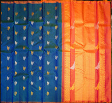 Load image into Gallery viewer,
Peacock Blue Borderless Silk Saree with Twin Parrot Butta in Gold and Silver Zari