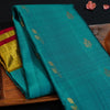 premiumkanchipuram silk saree inTeal blue & olive green with retta pettu boder