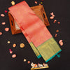 close view of premium bridal kanchipuram silk saree in peach orange colour with korvai border