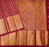 close view of premium bridal kanchipuram silk saree in Aesthetic maroon colour in pure gold zari