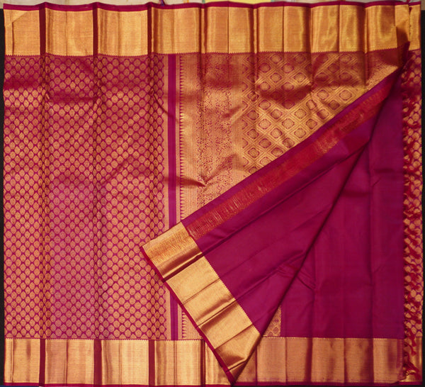 close view of premium bridal kanchipuram silk saree in Aesthetic maroon colour in pure gold zari
