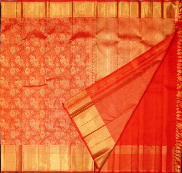 close view of premium bridal kanchipuram silk saree red half tissue in traditional borders