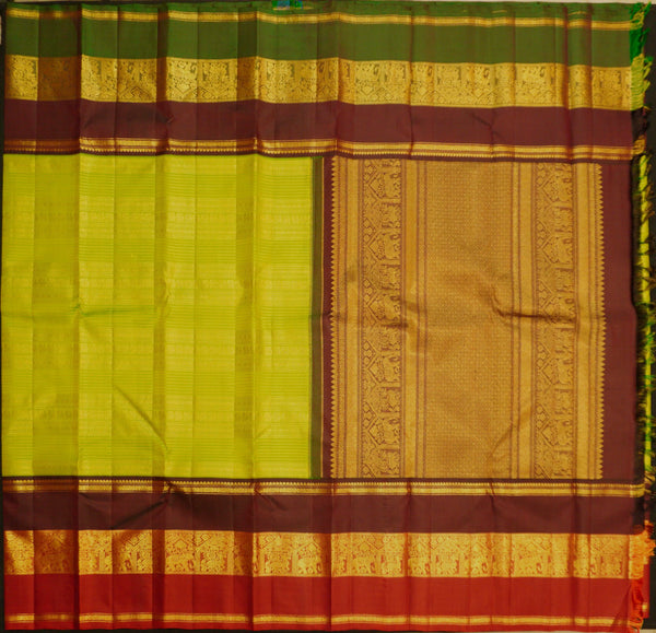 premium veldhari zaari lines kanchipuram silk saree in parrot green
