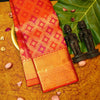 Close view of premium bridal kanchipuram silk saree in red colour with Geomentric Diamond Zari Motifs