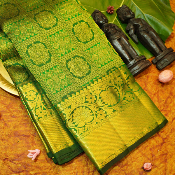 Close view of premium Traditional kanchipuram silk saree in Bottle Green colour with Pearl Beaded Grid Checks