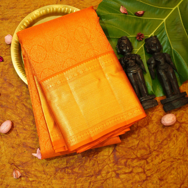 premium traditional wedding kanchipuram silk saree inRust orange with floral checks