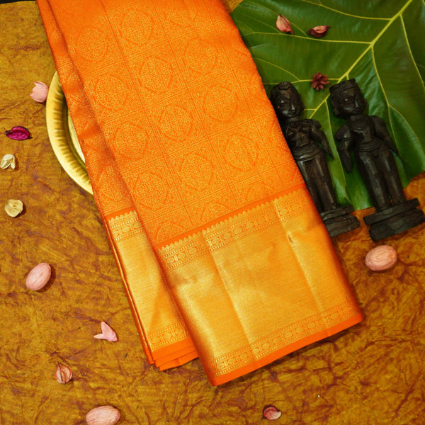 premium traditional wedding kanchipuram silk saree inRust orange with floral checks