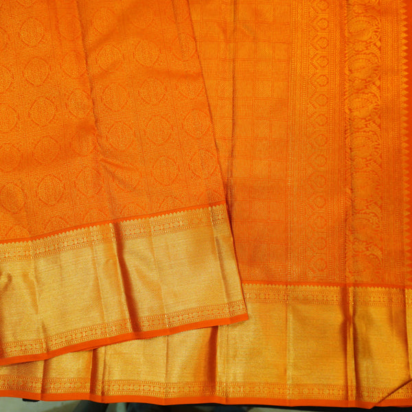 premium traditional wedding kanchipuram silk saree inRust orange with floral checks