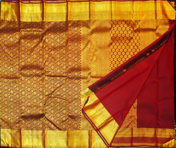 Close view of premium bridal kanchipuram silk saree in coffee brown colour with floral vine design