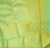 Close view of premium bridal kanchipuram silk saree in pastel green colour with geomentric floral design