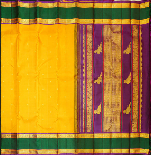 Premeium Traditional kanchipuram silk saree in Mustard Yellow colour with retta pettu korvai border