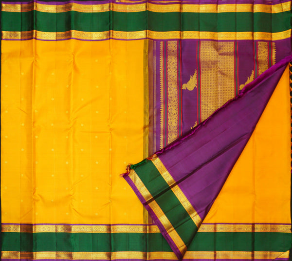 Premeium Traditional kanchipuram silk saree in Mustard Yellow colour with retta pettu korvai border