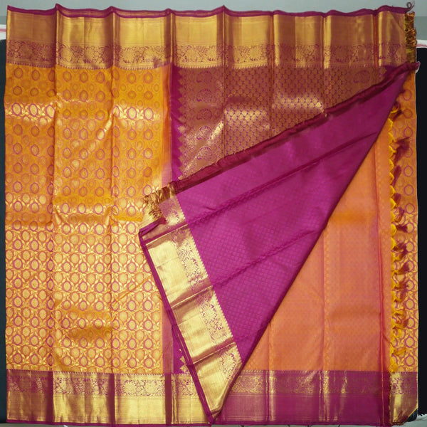 Traditional Pumpkin Orange Kanchipuram Silk Saree with Zari Chakaram Brocade and Magenta Korvai Border - Vivaaha Silks & Sarees