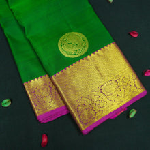 Load image into Gallery viewer, Bottle green Kanchipuram silk saree with magenta border, rich gold zari pallu, and round zari motifs – traditional South Indian wedding saree from Vivaaha Silks.