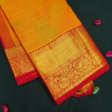 Load image into Gallery viewer, Mango yellow Kanchipuram silk saree with gold zari mango butta motifs, traditional red border, and rich pallu – bridal silk saree by Vivaaha Silks.