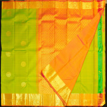 Load image into Gallery viewer, Parrot green Kanchipuram silk saree with pink orange zari border and gold buttas, traditional pattu saree for wedding wear.