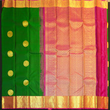 Load image into Gallery viewer, Bottle green Kanchipuram silk saree with magenta border, rich gold zari pallu, and round zari motifs – traditional South Indian wedding saree from Vivaaha Silks.