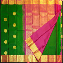 Load image into Gallery viewer, Bottle green Kanchipuram silk saree with magenta border, rich gold zari pallu, and round zari motifs – traditional South Indian wedding saree from Vivaaha Silks.