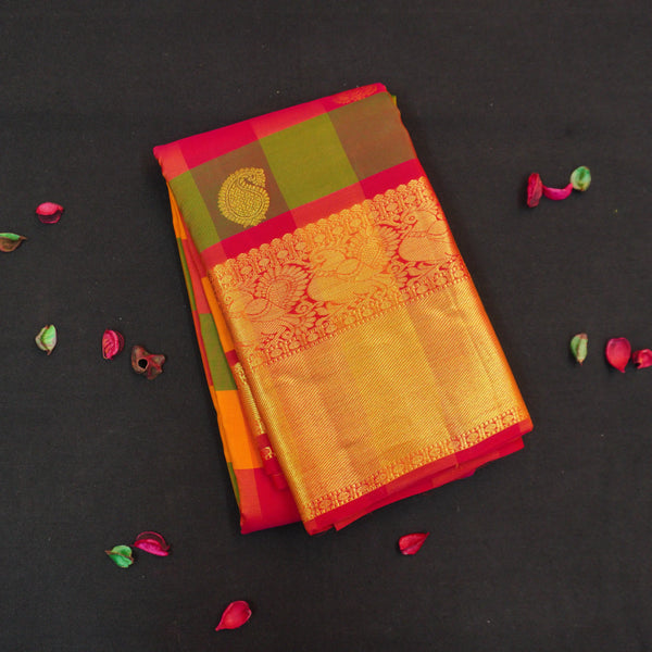 Classic Palum Pazham Kattam Kanchipuram silk saree from Vivaaha Silks with mango and thilagam butta, annam motif border, and rich red zari pallu.