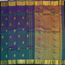 Load image into Gallery viewer, Peacock blue Kanchipuram silk saree from Vivaaha Silks budget collection featuring gold annam and chakaram butta, and a grand zari pallu with paisley and diamond motifs.