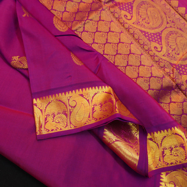 Vadamalli violet Kanchipuram silk saree from Vivaaha Silks budget collection featuring gold annam and chakaram butta with a rich traditional gold zari pallu.