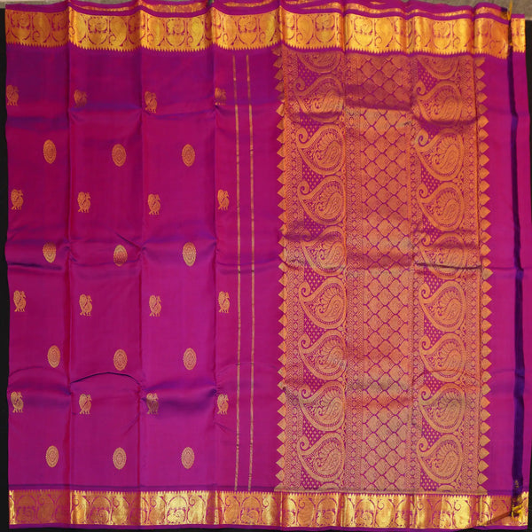 Vadamalli violet Kanchipuram silk saree from Vivaaha Silks budget collection featuring gold annam and chakaram butta with a rich traditional gold zari pallu.