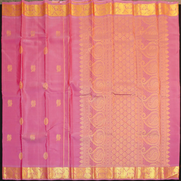 Baby pink Kanchipuram silk saree from Vivaaha Silks budget collection with golden annam and chakaram butta, rich zari pallu and traditional border.