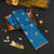 Peacock Blue Borderless Silk Saree with Twin Parrot Butta in Gold and Silver Zari