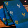 Peacock Blue Borderless Silk Saree with Twin Parrot Butta in Gold and Silver Zari