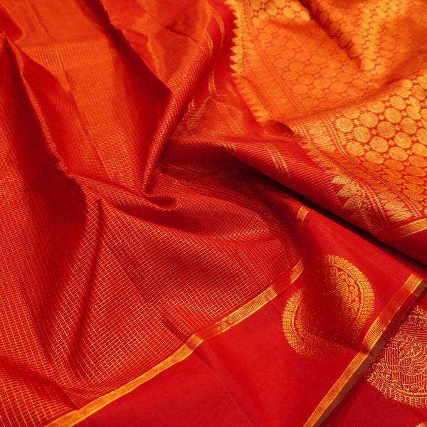 Chili Red Zari Kattam with Round Traditional Designer Peacock Butta in the Border