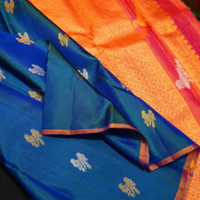 Load image into Gallery viewer, 
Peacock Blue Borderless Silk Saree with Twin Parrot Butta in Gold and Silver Zari
