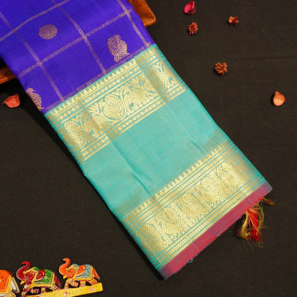 MS Blue Veldhari Kattam With Peacock & Rudratcham Butta in gold Zari, Retta Pettu Korvai Border in Aqua Blue