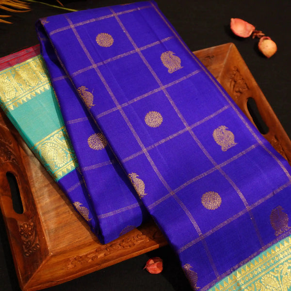 MS Blue Veldhari Kattam With Peacock & Rudratcham Butta in gold Zari, Retta Pettu Korvai Border in Aqua Blue