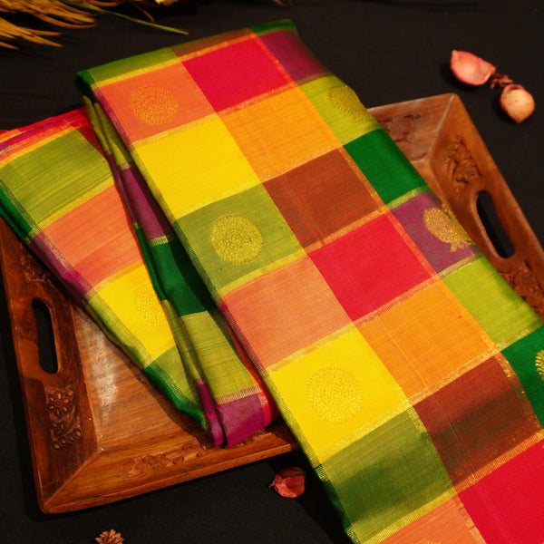 Full Flat Lay of Rainbow Kattam Kanchipuram Silk Saree showing Multi-Colour Check Body and Grand Red-Orange Annam Gold Zari Brocade Pall