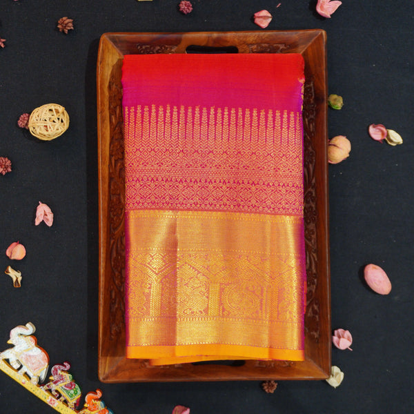 Rani Pink & yellow Kanjivaram silk saree with floral design