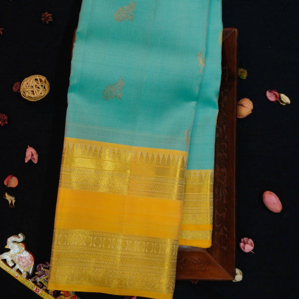 premiumkanchipuram silk saree inPastel Blue With Camel & Peacock Design 