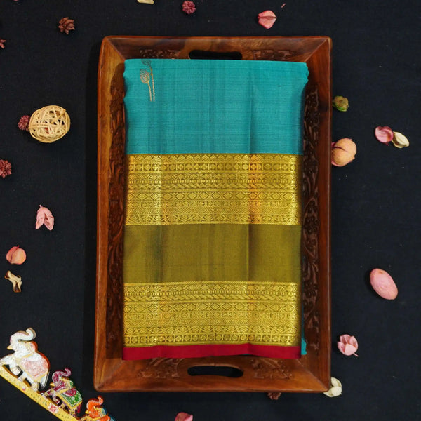 premiumkanchipuram silk saree inTeal blue & olive green with retta pettu boder