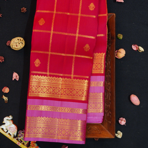 Red Kanchipuram silk saree with kattam jaal, vatta butta and pink Tharai Jaal border