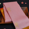 Baby pink Kanchipuram silk saree with gold annam butta motifs and orange-gold Korvai border