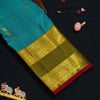 premiumkanchipuram silk saree inTeal blue & olive green with retta pettu boder