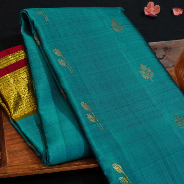 premiumkanchipuram silk saree inTeal blue & olive green with retta pettu boder