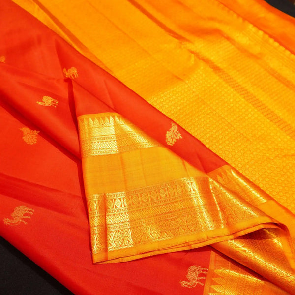 Red with Orange Retta Pettu Border Kanchipuram Silk Saree with Camel & Peacock motif