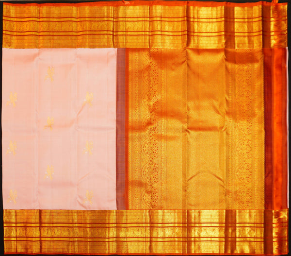 Baby pink Kanchipuram silk saree with gold annam butta motifs and orange-gold Korvai border