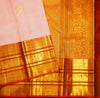 Baby pink Kanchipuram silk saree with gold annam butta motifs and orange-gold Korvai border