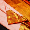 Baby pink Kanchipuram silk saree with gold annam butta motifs and orange-gold Korvai border