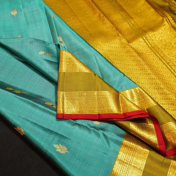 premiumkanchipuram silk saree inTeal blue & olive green with retta pettu boder