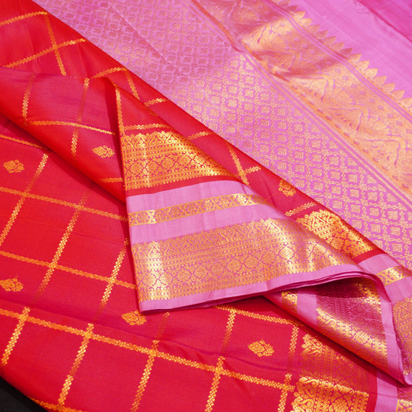Red Kanchipuram silk saree with kattam jaal, vatta butta and pink Tharai Jaal border
