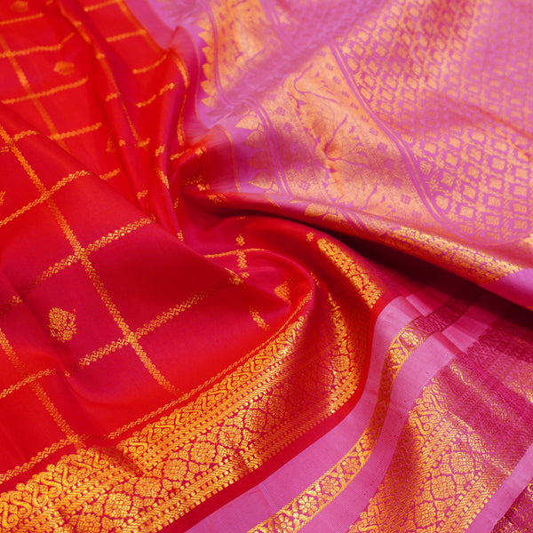Red Kanchipuram silk saree with kattam jaal, vatta butta and pink Tharai Jaal border